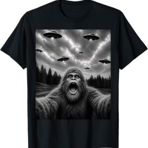 Bigfoot UFO Selfie T-Shirt featuring Sasquatch taking a selfie beneath multiple flying saucers.