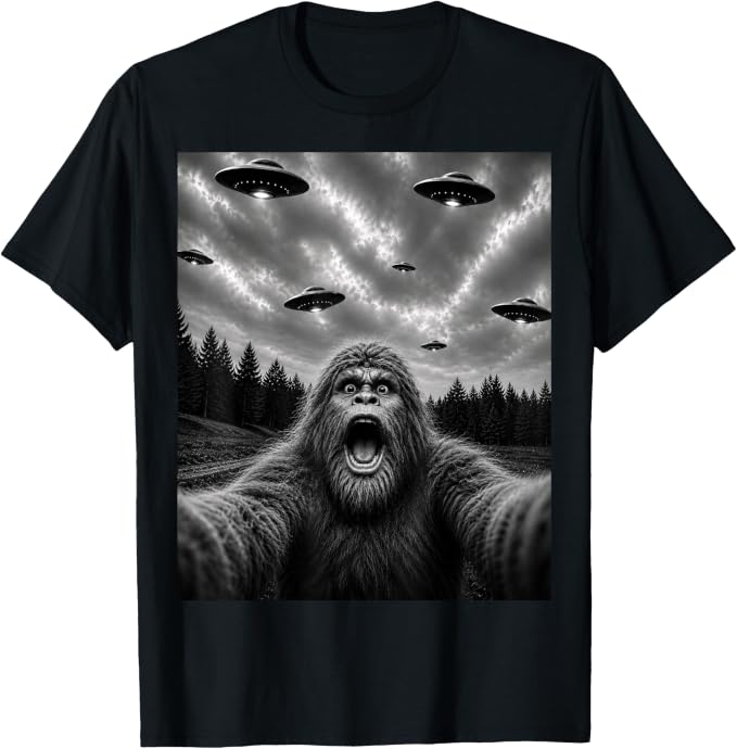 Bigfoot UFO Selfie T-Shirt featuring Sasquatch taking a selfie beneath multiple flying saucers.